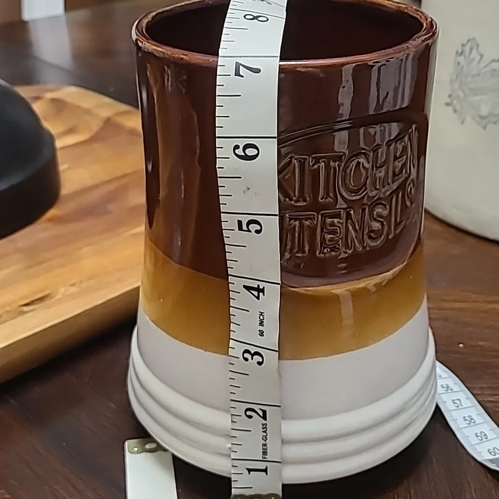 Vintage kitchen utensils holder.
